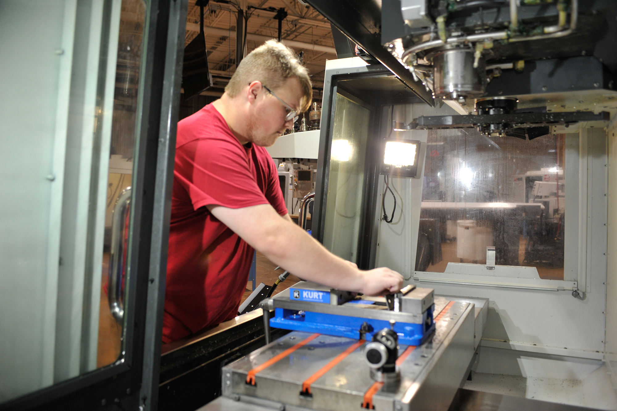 Student working on a CNC machine.